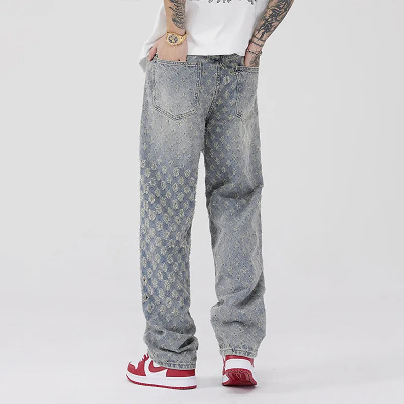 All-Over Monogram Washed Denim Jeans.