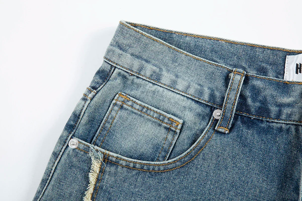 Two-Tone Distressed Denim Shorts.