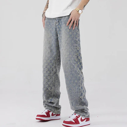 All-Over Monogram Washed Denim Jeans.