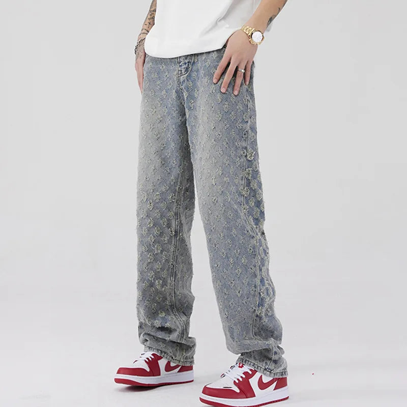 All-Over Monogram Washed Denim Jeans.