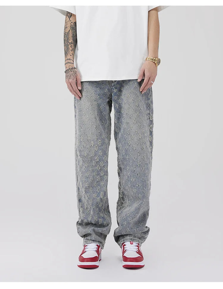 All-Over Monogram Washed Denim Jeans.