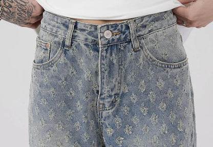 All-Over Monogram Washed Denim Jeans.