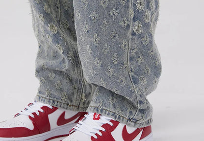All-Over Monogram Washed Denim Jeans.