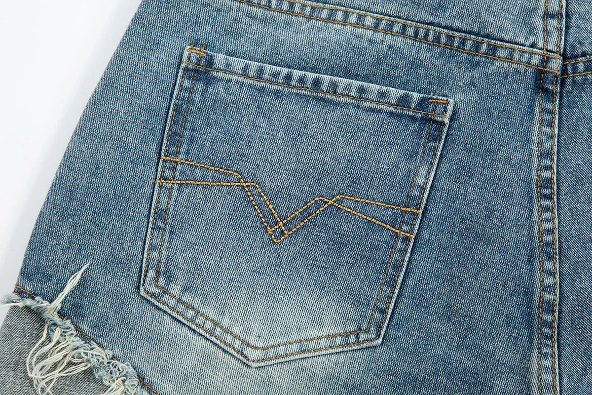 Two-Tone Distressed Denim Shorts.