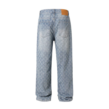 All-Over Monogram Washed Denim Jeans.